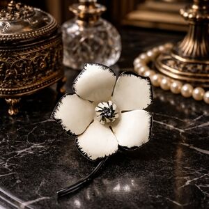 VINTAGE COUTURE ENAMEL FLOWER BROOCH WHITE BLACK EDGE PETALS MID-CENTURY GLAM